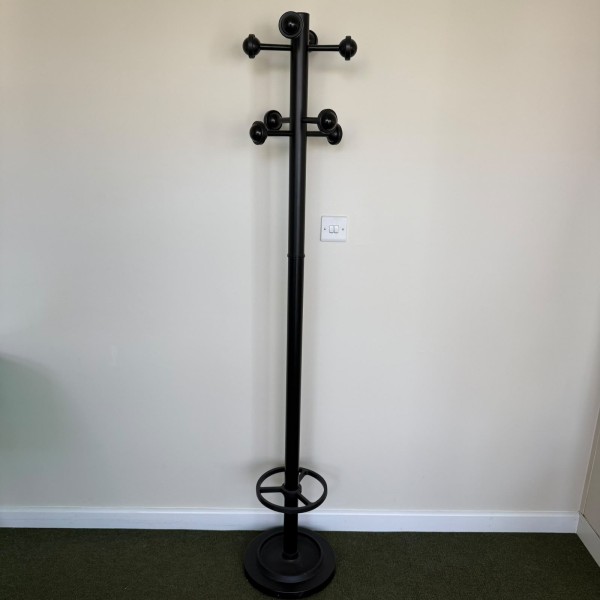 Black Coat and Umbrella Stand